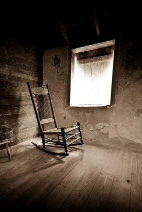 Halloween FX Props styling image of an empty rocking chair in a shadowy room
